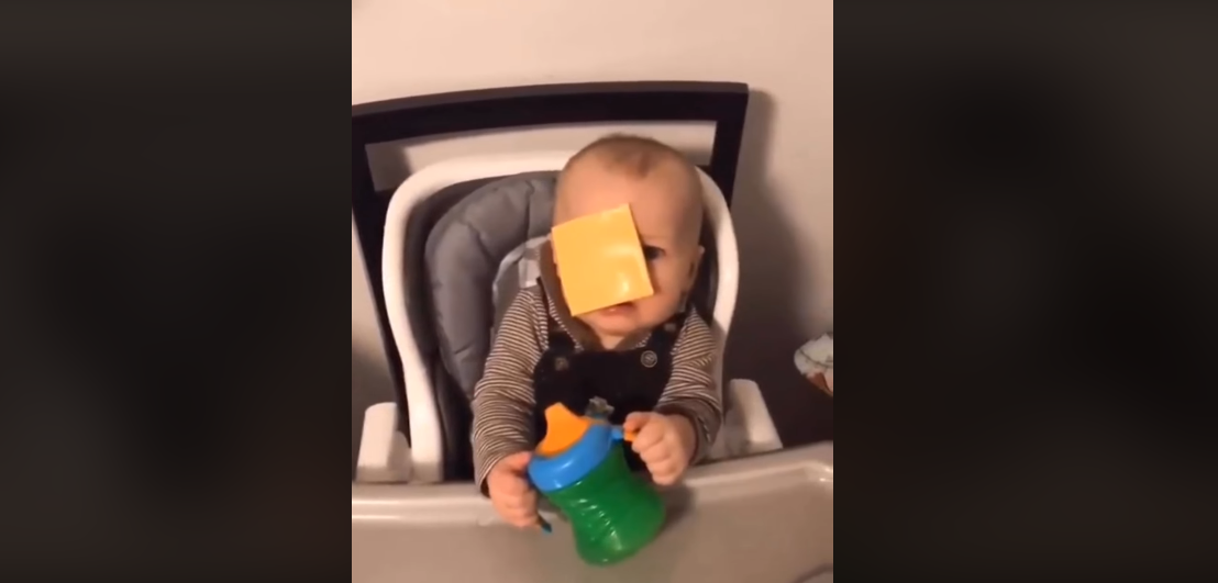 Why are people throwing cheese at babies?