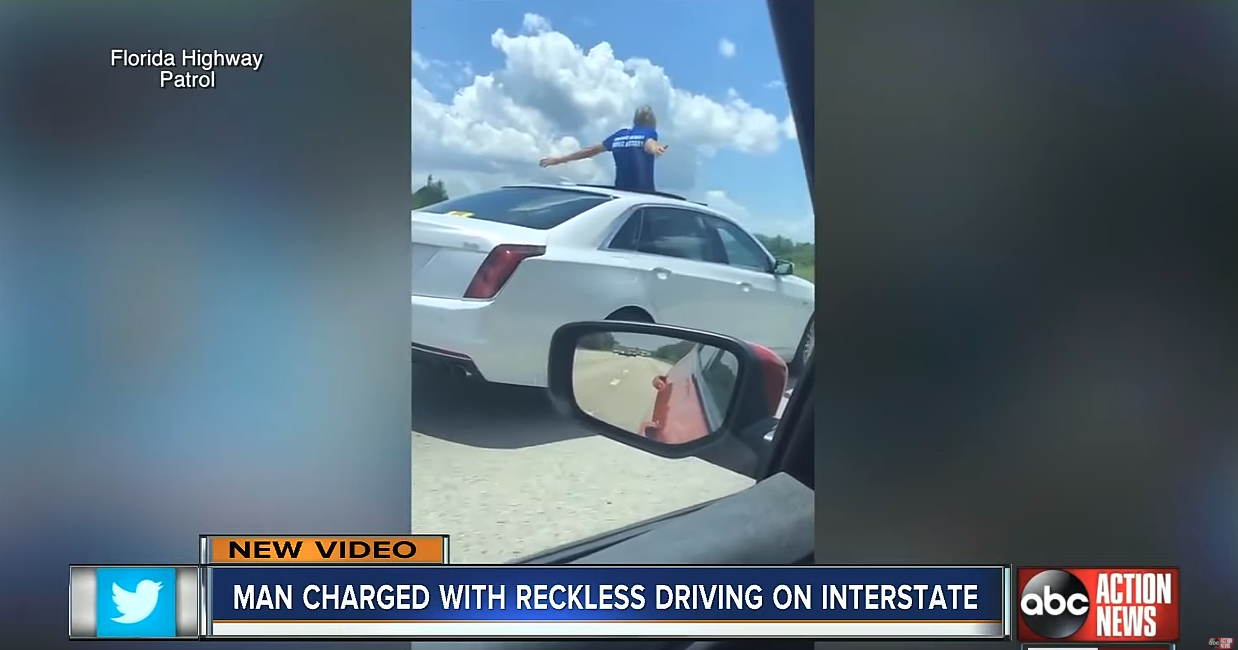 WTF News: Driver caught standing through sunroof