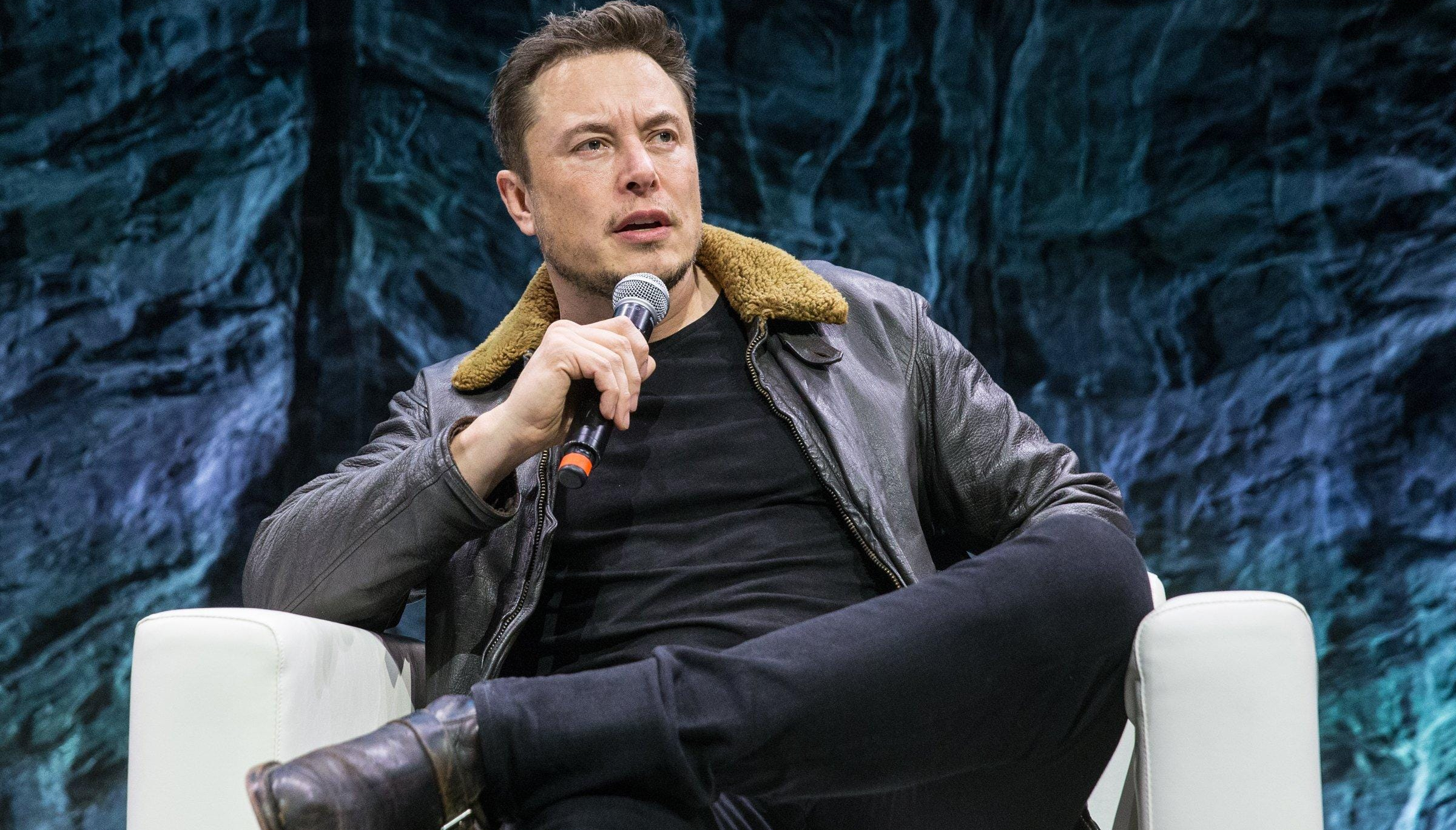 Elon Musk shrivels under the spotlight, booed off stage at Dave Chappelle gig