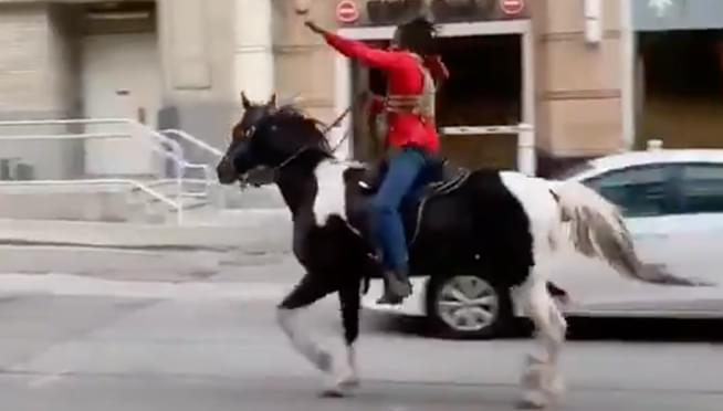 Chicago’s inner-city horseback rider, the “Dreadhead Cowboy,” rides to spread positivity and peace among protests
