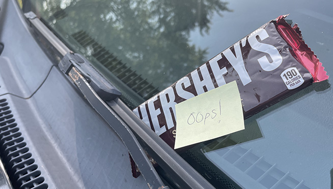 Someone crashed into a car and left candy bars instead of their info…