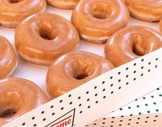 Krispy Kreme Is Giving Out Free Dozens Of Original Glazed Donuts With A BOGO Deal