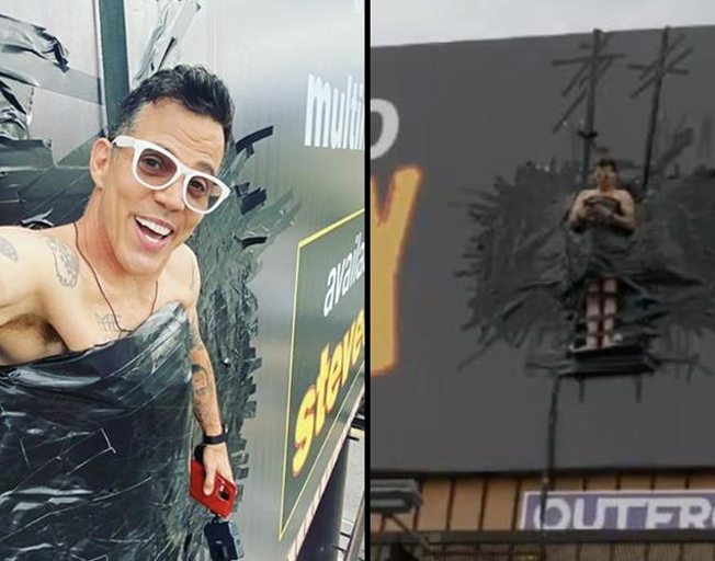 Steve-O Duct-Tapes Himself To L.A. Billboard