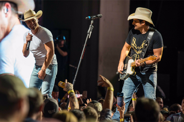 Dustin Lynch Became Friends with Brad Paisley over Cigars and Guitars