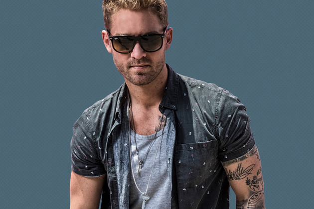 Why does Brett Young Love Touring?