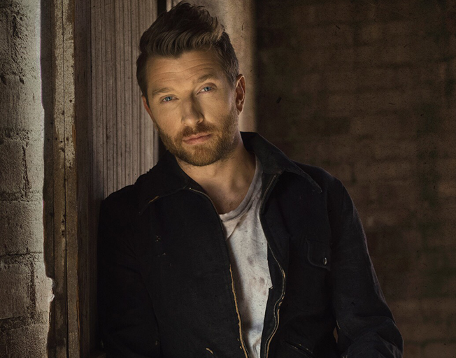 Brett Eldredge Scores first Number One in Over Two Years with “Love Someone”