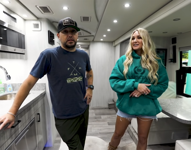 Jason Aldean and Brittany Kerr on a tour bus.