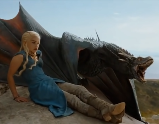 Daenerys Targaryen, played by Emilia Clarke, with a dragon in 'Game of Thrones'
