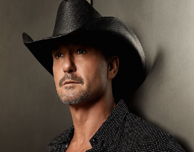Tim McGraw Makes Surprise Phone Call To Russell Dickerson To Invite Him On Tour