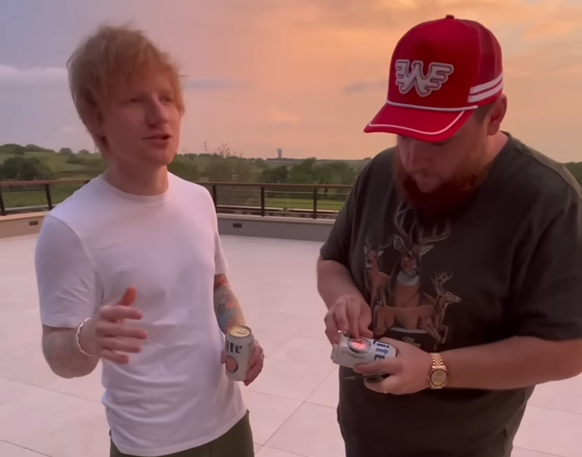 Watch Luke Combs Teach Ed Sheeran How to Shotgun a Beer