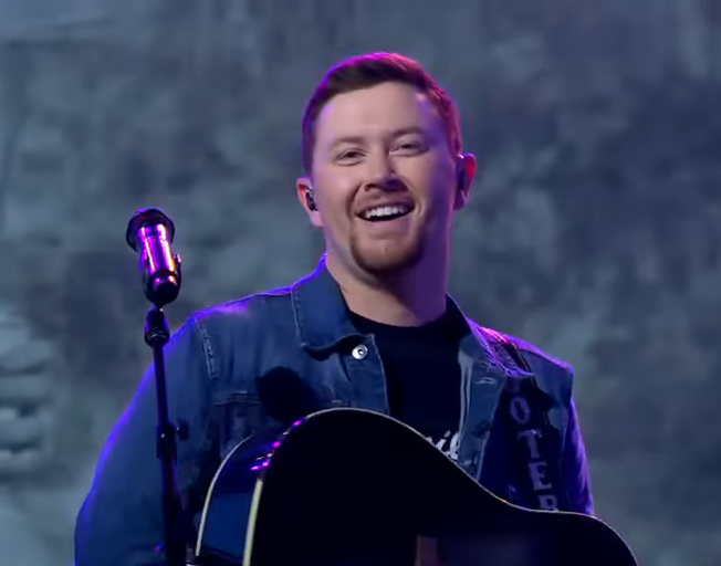 Watch: Scotty McCreery Invited to Join Grand Ole Opry by Garth Brooks