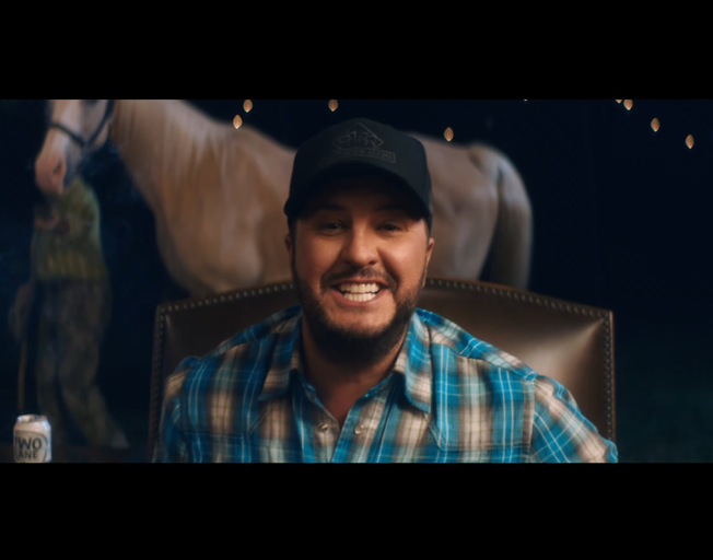 Watch: Luke Bryan Hitches a Ride in Carefree New Music Video