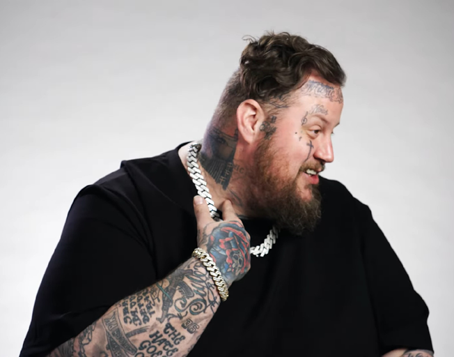 Watch: Jelly Roll Explains His Misspelled Neck Tattoo