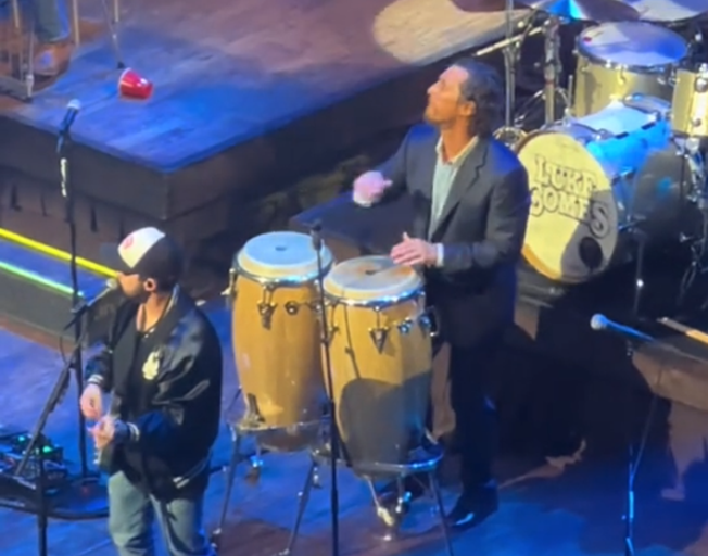 Watch: Matthew McConaughey Crashes Luke Combs’ Set & Plays the Bongos During “Copperhead Road”