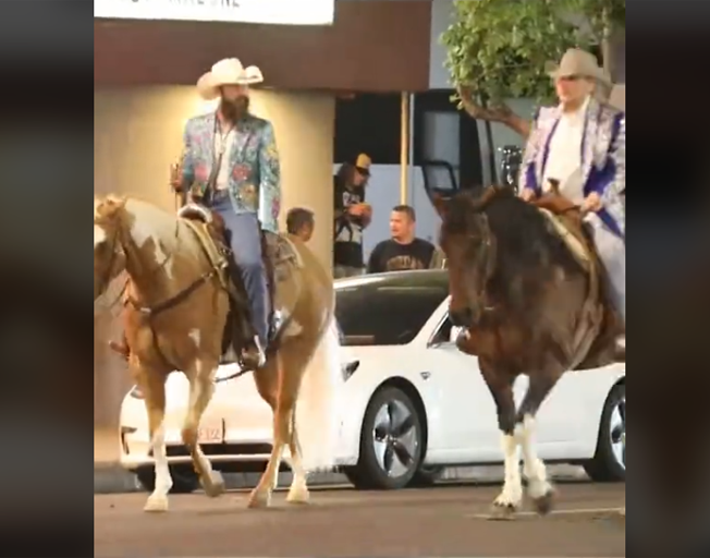 Watch: Post Malone and Dwight Yoakum Ride Horses on Sunset Boulevard in Music Video Shoot