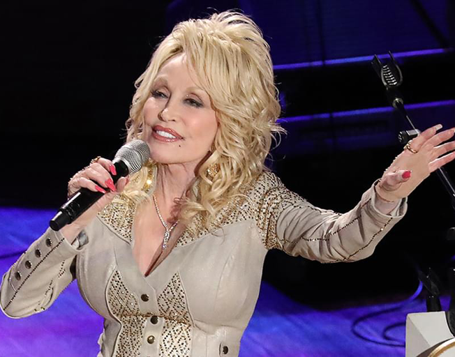 If You Look Like Dolly Parton, The REAL Dolly Wants to Find You!