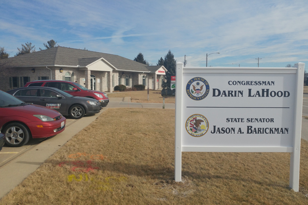 Indivisible IL-18 met at Congressman Darin LaHood's office to give a LaHood's staff a letter addressing their concerns with President Trump. (Photo by Patrick Baron/WJBC)