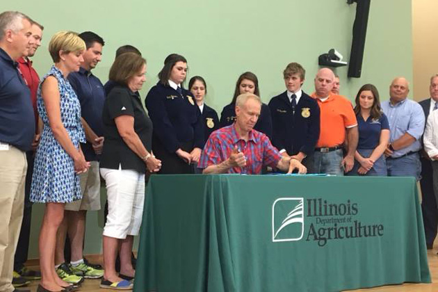 Rauner signs agriculture bills at Illinois State Fair