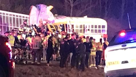 Two dead as semi hits Normal West school bus head-on with JV athletes on board