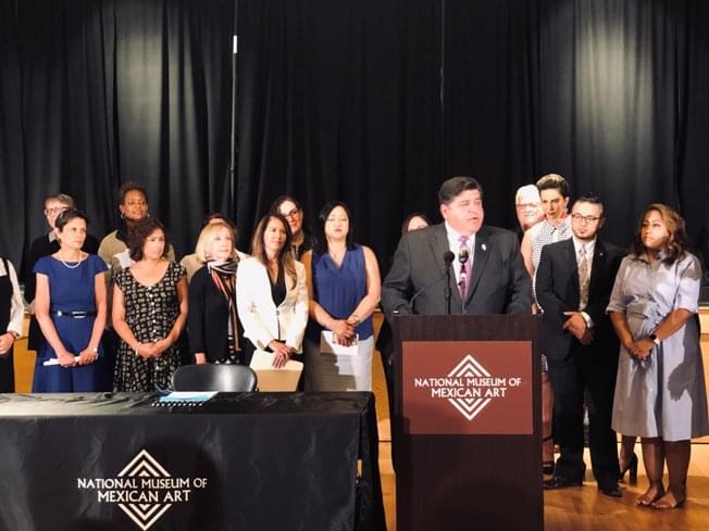 Gov. Pritzker signs two new laws to help protect immigrant youth