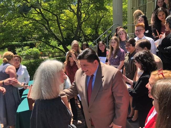 Pritzker signs law intended to close the pay gap