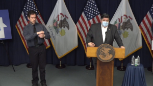 Gov. Pritzker says mask up until 2021