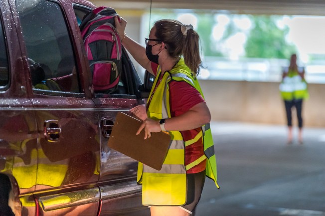 Local organization distributes over 4,000 backpacks and school supplies