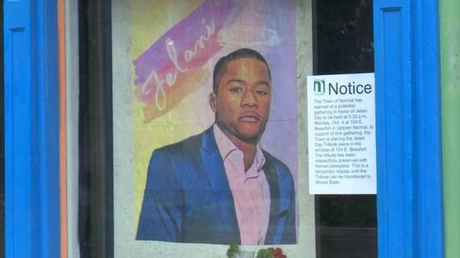 Jelani Day mural back on display amid protest