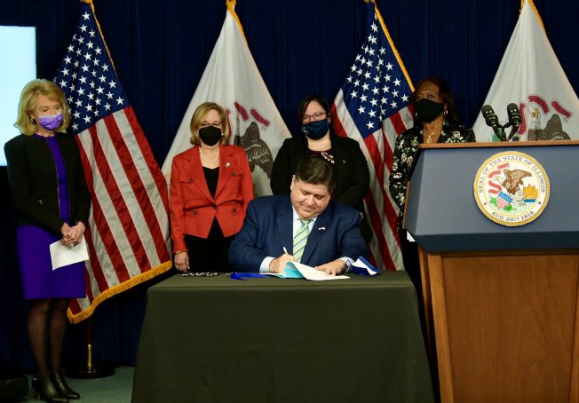 Governor signs new law setting up a state licensing system for midwives