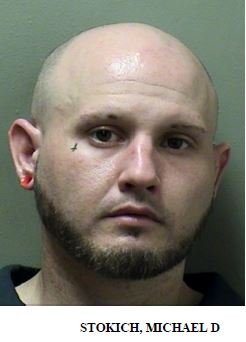 Alton man behind bars in McLean County on multiple weapon charges