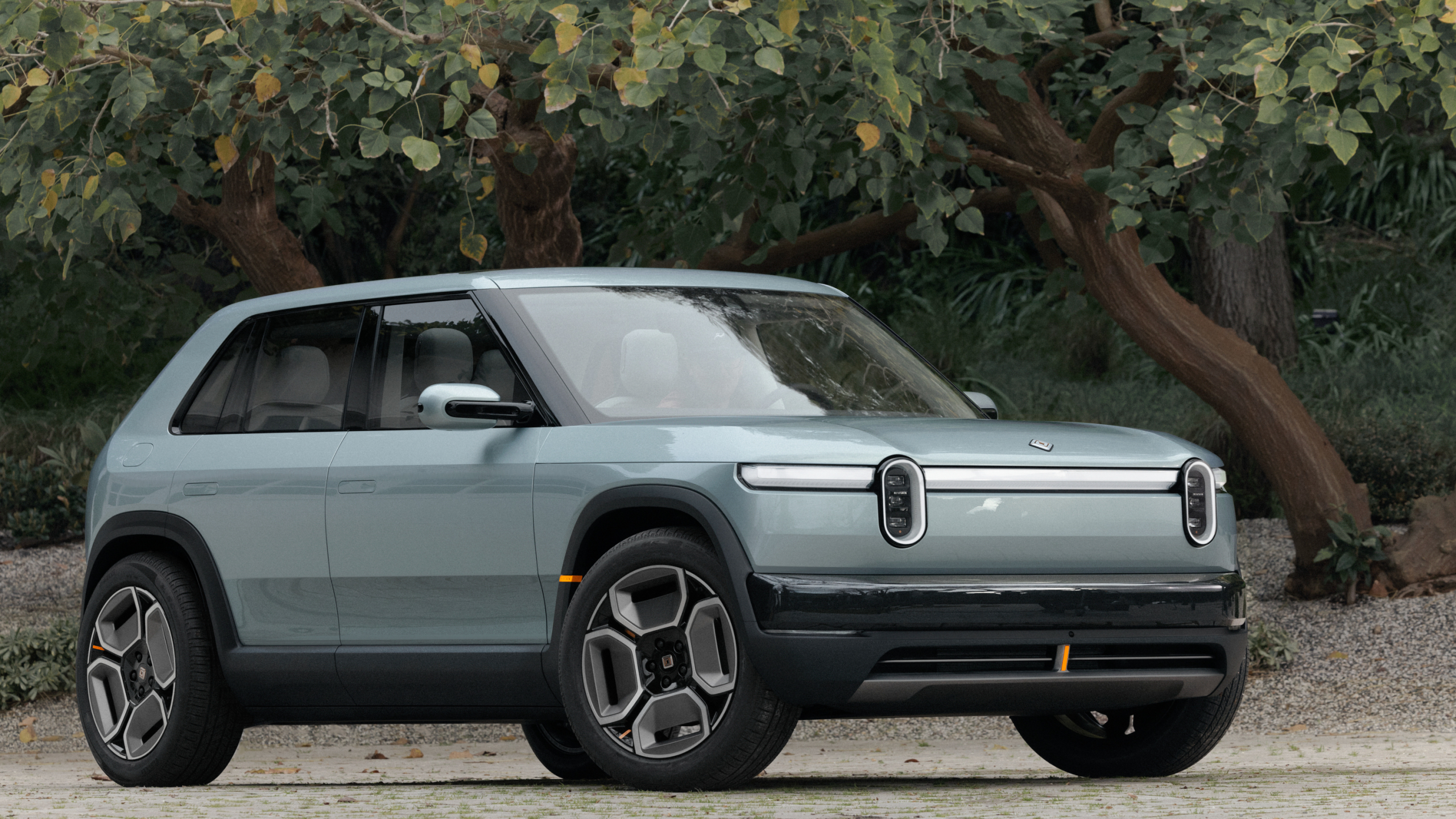 Rivian reveals new vehicles, shifts new EV vehicle production to factory in Normal