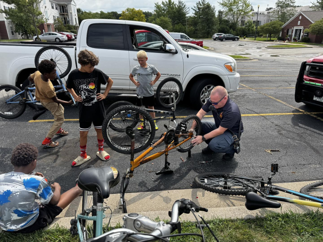 Normal firefighters take time to repair bikes after apartment fire