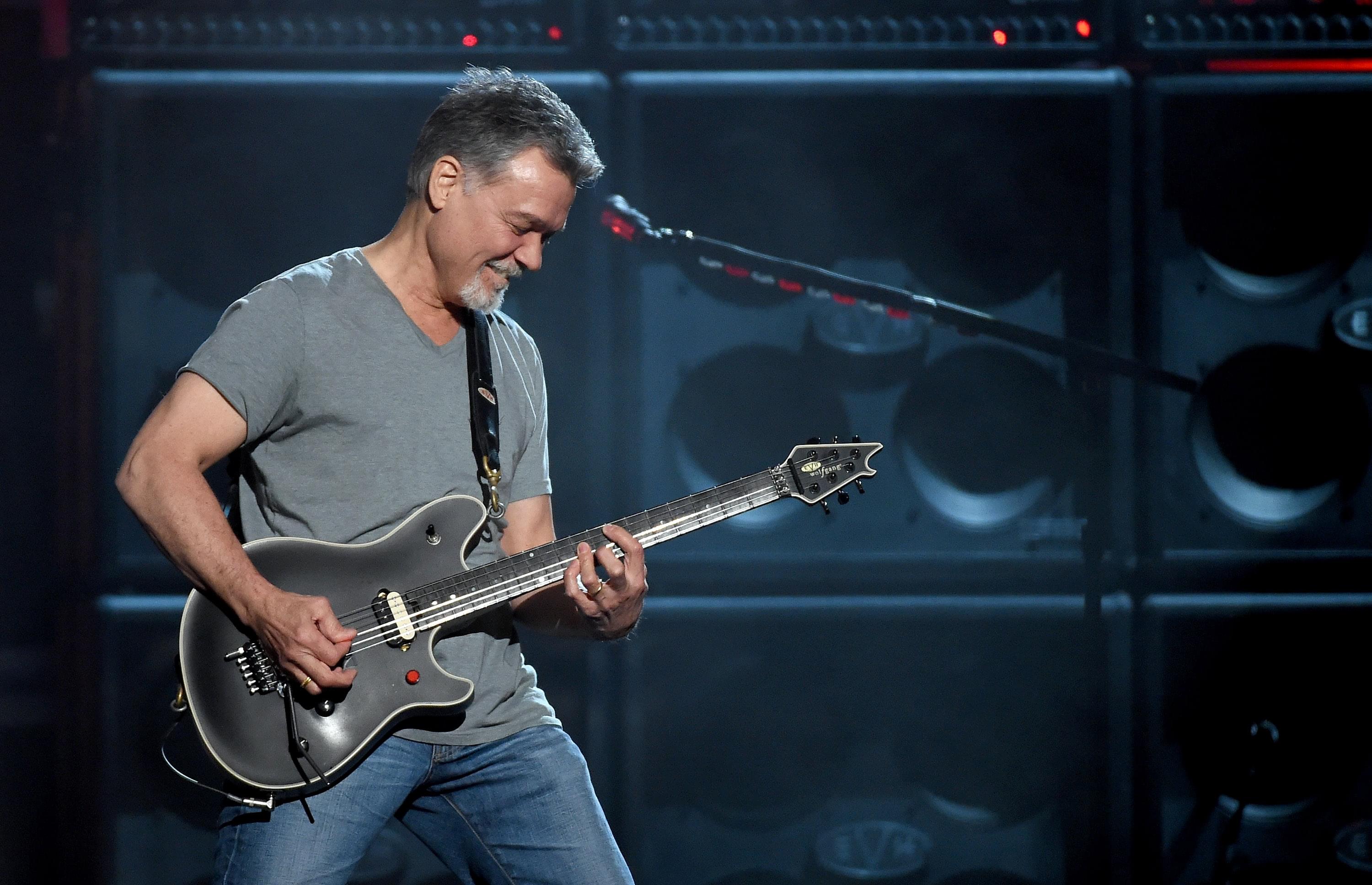 Ooops!  Fan Unknowingly Asks Eddie Van Halen To Take His Picture!