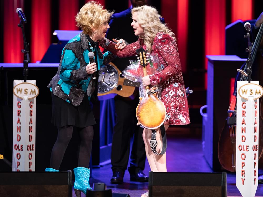 Watch Jeannie Seely Surprise Rhonda Vincent With Invitation to Join the Grand Ole Opry