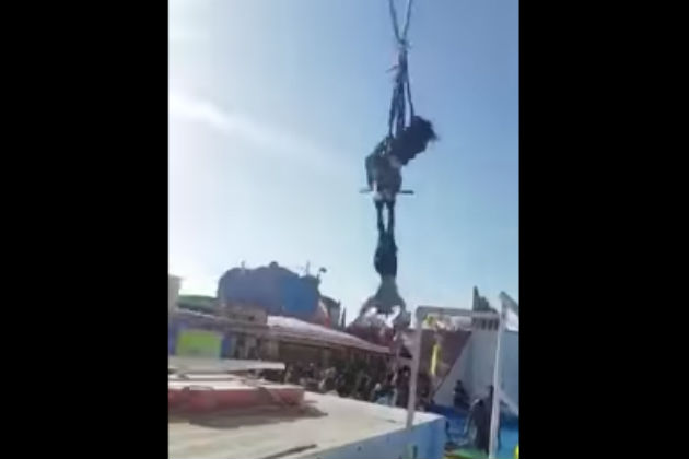 Watch This Girl Fall Out of Her Harness On One of Those Bungee Rides