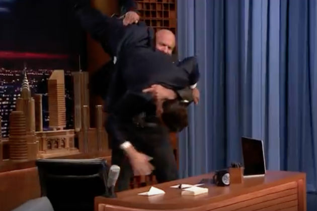 Watch WWE Superstar Triple H Put Jimmy Fallon Through a Desk [VIDEO]