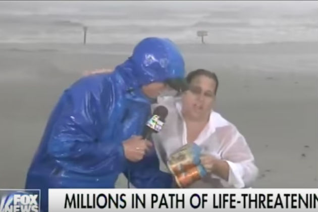 Watch This Woman Interrupt Hurricane Harvey Coverage to Give Reporter Beer