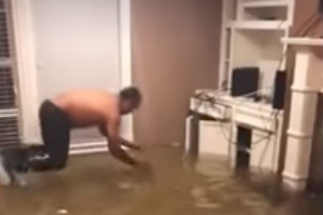 Watch This Guy Catch a Fish Bare-Handed in Home Flooded by Hurricane Harvey