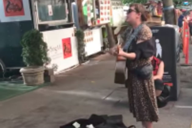 Here’s a Street Performer Singing a Dirty Song About What She Would Do for a Cup of Coffee