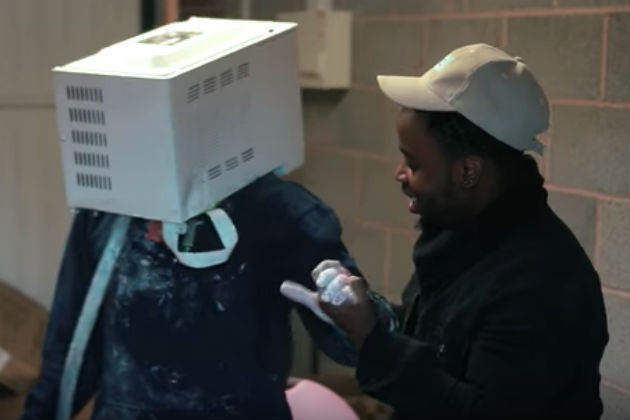 This Guy Got His Head Cemented Into a Microwave For Some Reason [VIDEO]