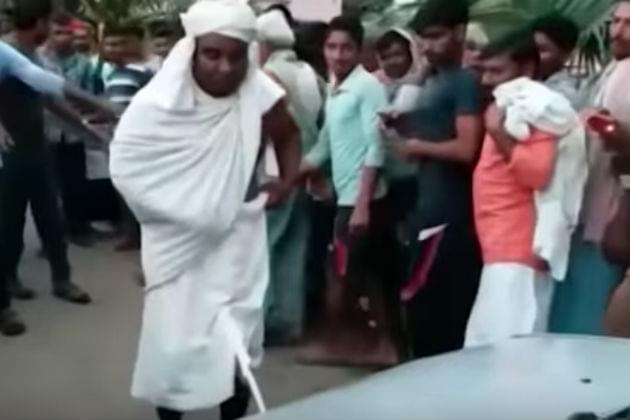 Watch This Religious Leader Pull a Car With His Dong [VIDEO]