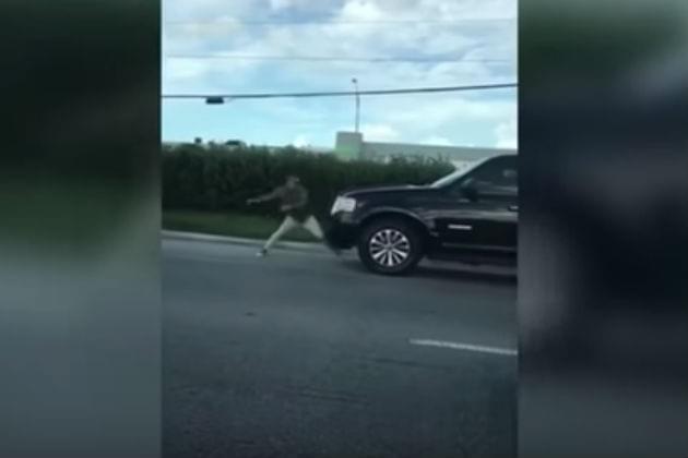 This Guy’s Road Rage Leads Him to Punch an SUV with His Bare Hands [VIDEO]