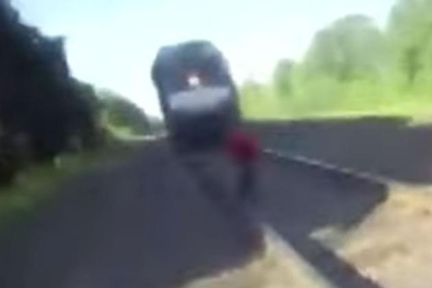 Watch This Cop Save a Man Who’s In the Path of an Oncoming Train [VIDEO]