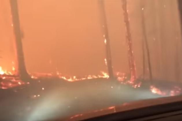 Watch These Hikers Attempt to Escape a Wildfire By Driving Through It [VIDEO]