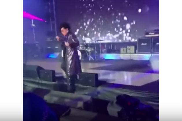 Watch This Prince Impersonator Fall Off Stage During His Set [VIDEO]