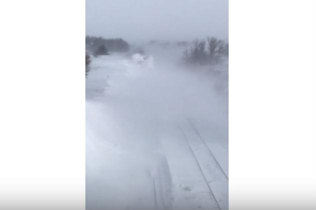 This Is What It Looks Like When a Train Hits a Massive Snowdrift [VIDEO]