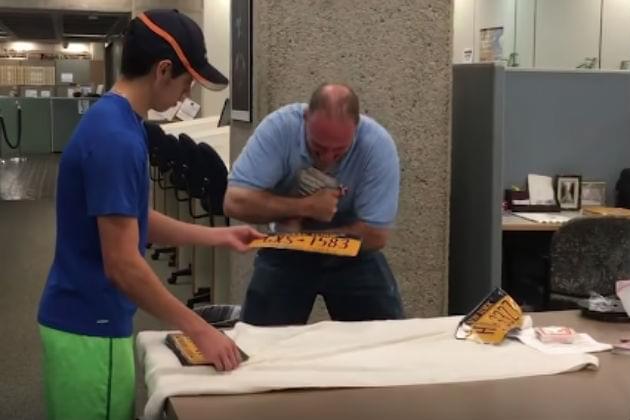 Watch This Guy Set the Guinness World Record for Most License Plates Ripped In Half [VIDEO]