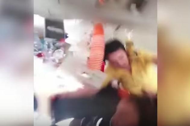 Extreme Turbulence Causes This Flight Attendant to Hit the Ceiling [VIDEO]