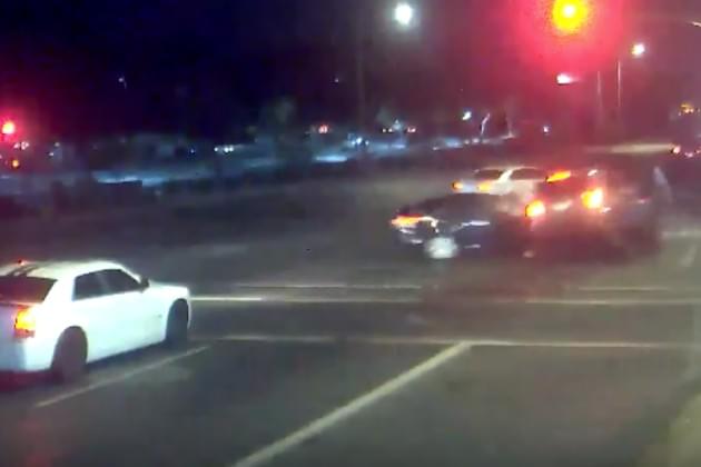 This Impaired Driver Ran a Red Light and Almost Hit a Couple Pushing a Stroller [VIDEO]