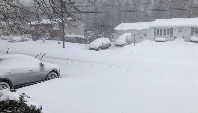 Winter storm lashes East Coast with deep snow, high winds